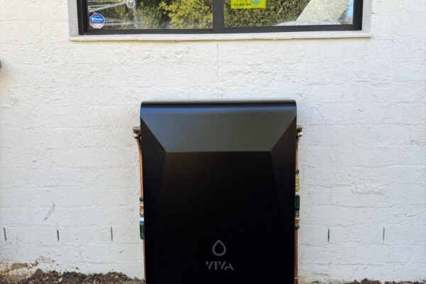 Completed Viva whole house water filtration system with protective cover installed by JRA Plumbing Services
